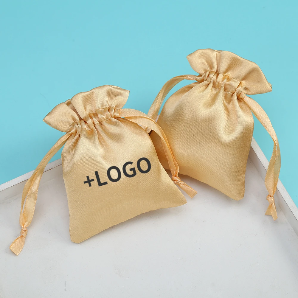 

100 шт., атласные мешочки на шнурке, золотистые/серые мешочки для хранения ювелирных изделий, украшения для свадебной вечеринки, подарки на заказ