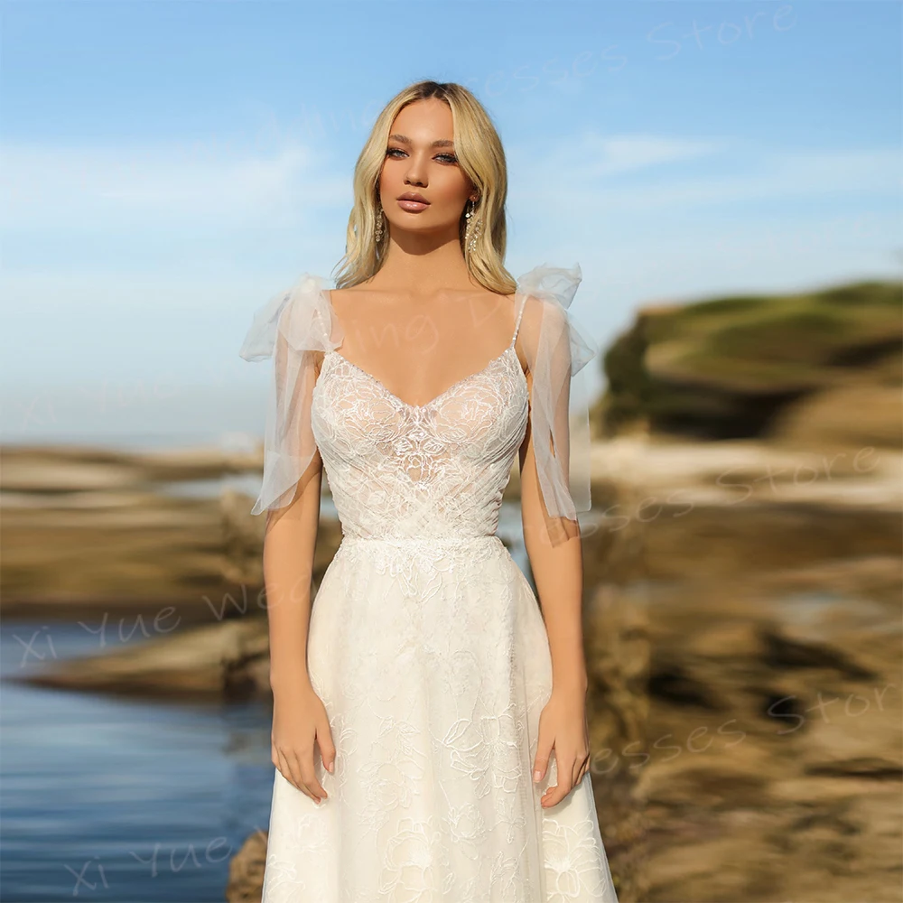 A Line Women's Wedding Dresses Appliques Lace Bride Gowns Spaghetti Straps Backless