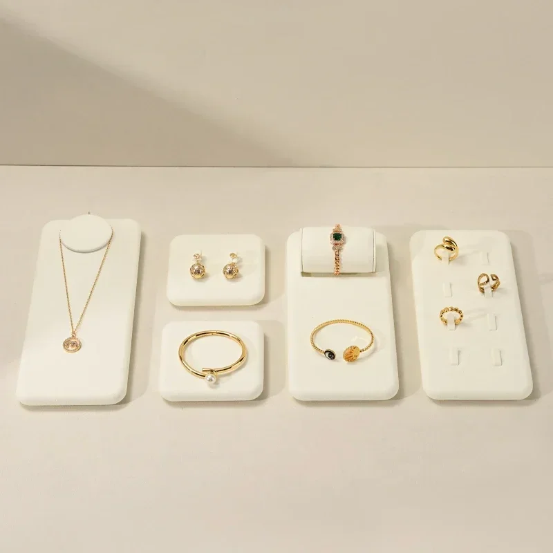 

White ultra fiber high-end jewelry display props, rings, earrings, necklaces, counters, jewelry trays, jewelry display racks