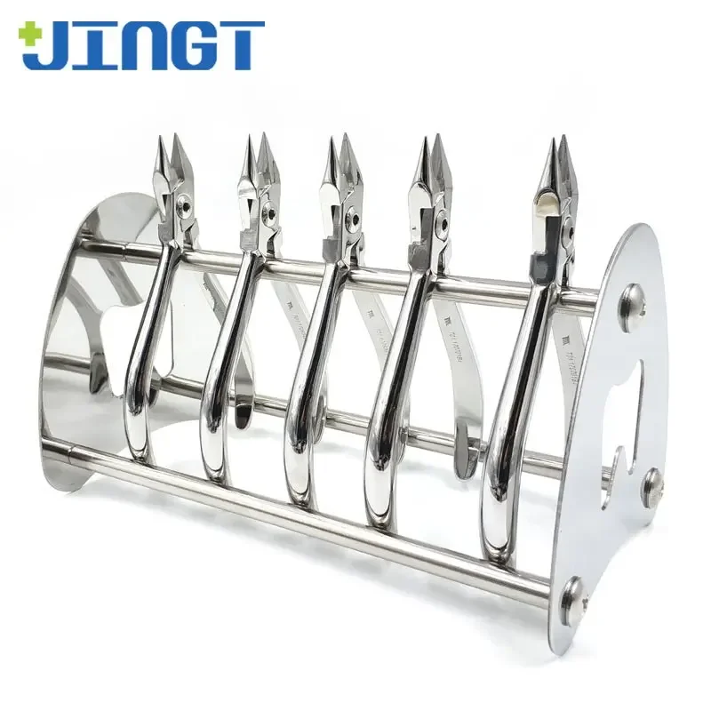 

Стоматологические технические зажимы, поместите щипцы из нержавеющей стали и плоскогубцы для вытяжки зубов на полку, поместите стойку на ортодонтический