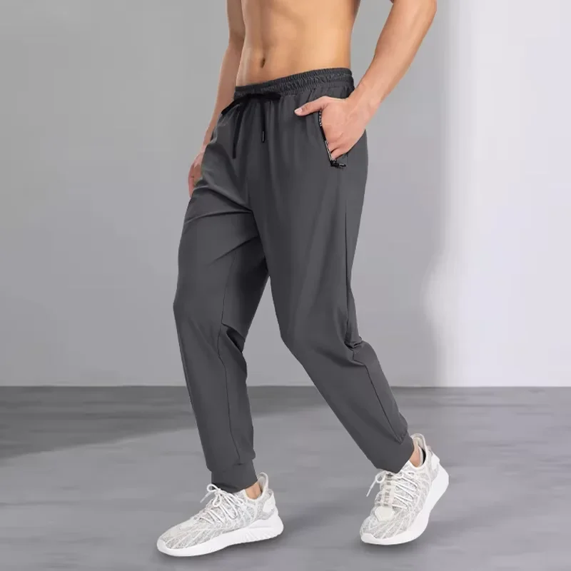 Ice silk pants men's quick drying elastic trend casual pants ultra-thin ice sports
