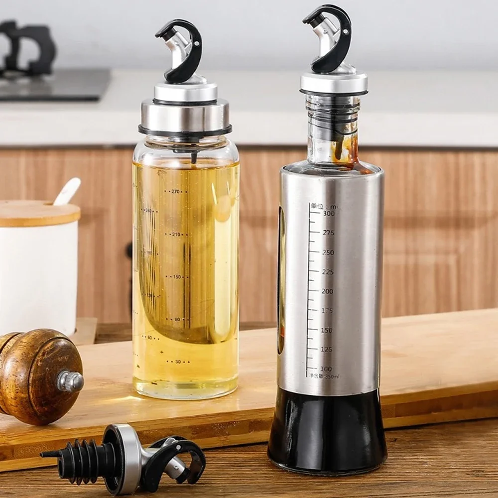 https://ae01.alicdn.com/kf/S10680b37202e4d8cb0cfee06af6577f4I/Automatic-Oil-Bottle-Stopper-Cap-Dispenser-Lock-Wine-Pourer-Sauce-Nozzle-Liquor-Leak-Proof-Plug-Bottle.jpg