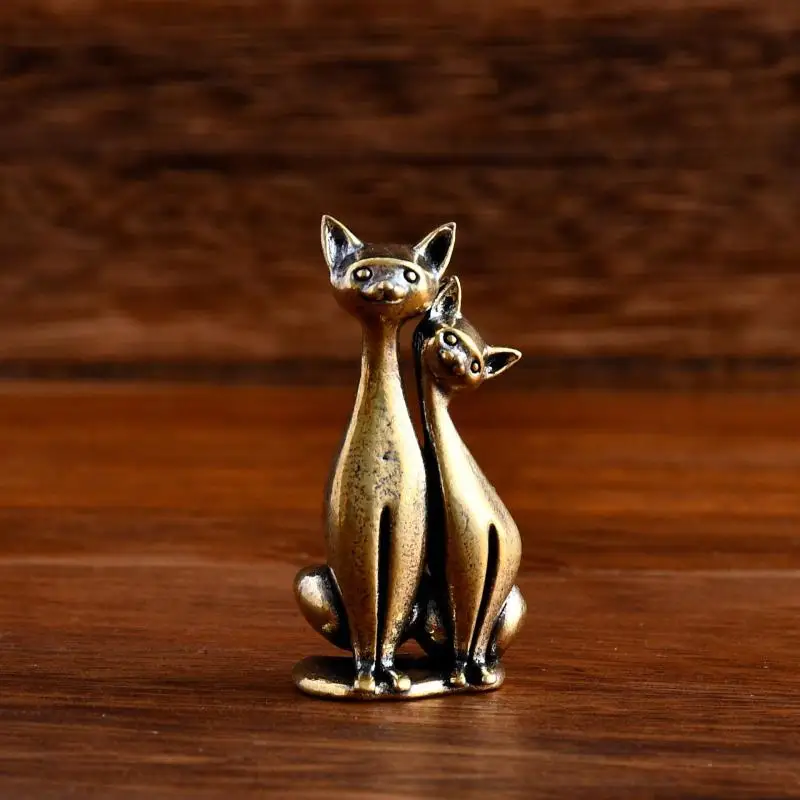 KittyNook Cat Co.’s Intertwined Loving Cats Brass Sculpture: two cats together, a touching, artistic décor piece.