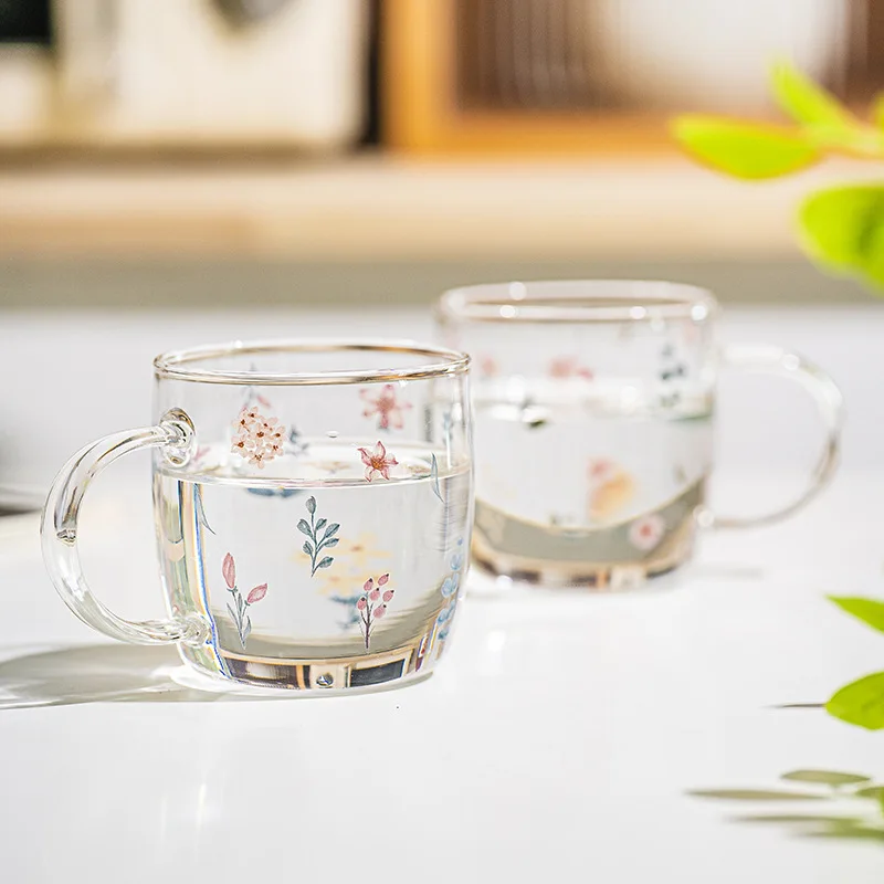 https://ae01.alicdn.com/kf/S10a611c0b91c49bfa238d367a9b48d418/Coffee-Mug-Borosilicate-Glass-Creative-Flower-Pattern-Tea-Water-Breakfast-Cup-with-Handle-Home-Transparent-Drinking.jpg