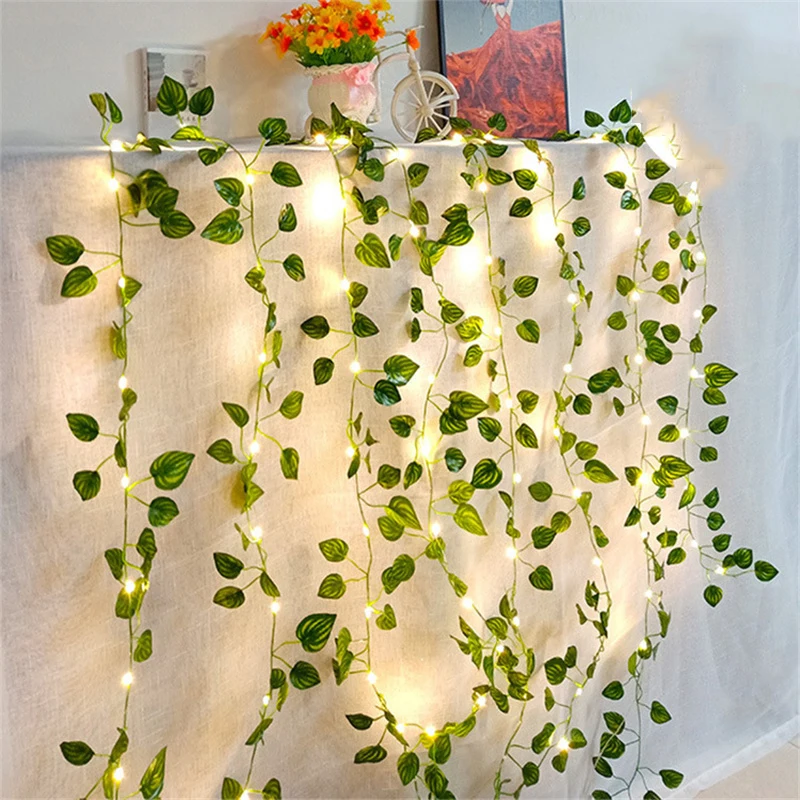 thumbnail image 1 of Guirnalda de luces artificiales con hojas verdes y flores de 2 a 10 m, guirnalda navideña alimentada por USB o batería para decoración del hogar, 1 of 5