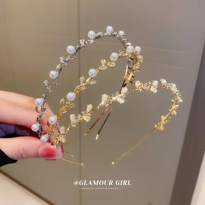 

Женская повязка на голову с жемчужинами и бриллиантами