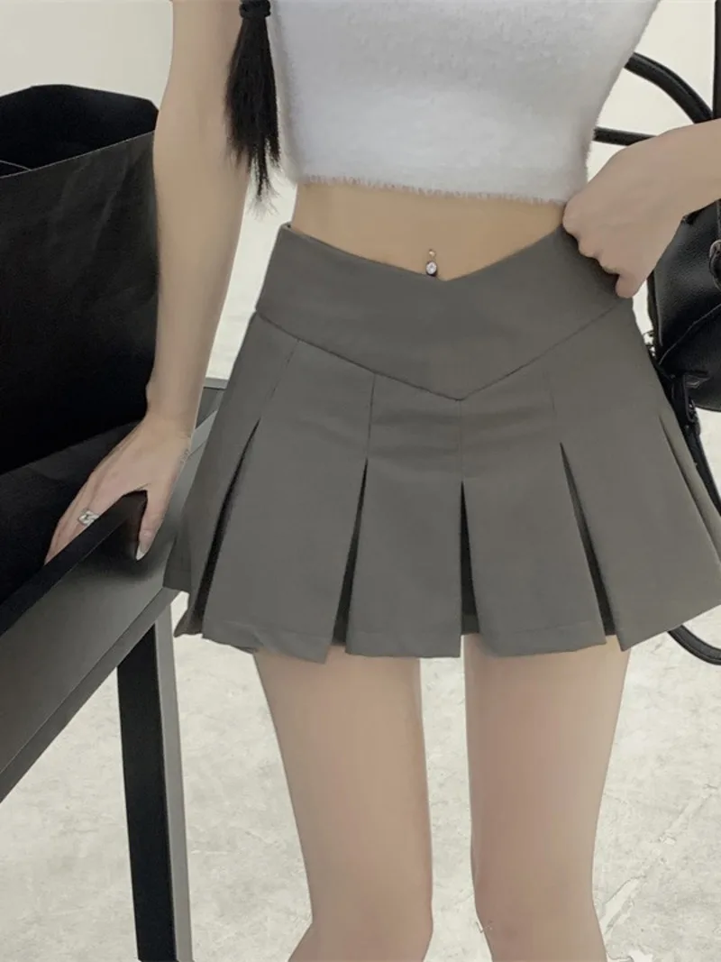 

2023 Summer Women's New Sexy Spicy Girls College Style Solid Color Pleated Half Skirt Fashion Low Waist A-line Short Skirt QSXT