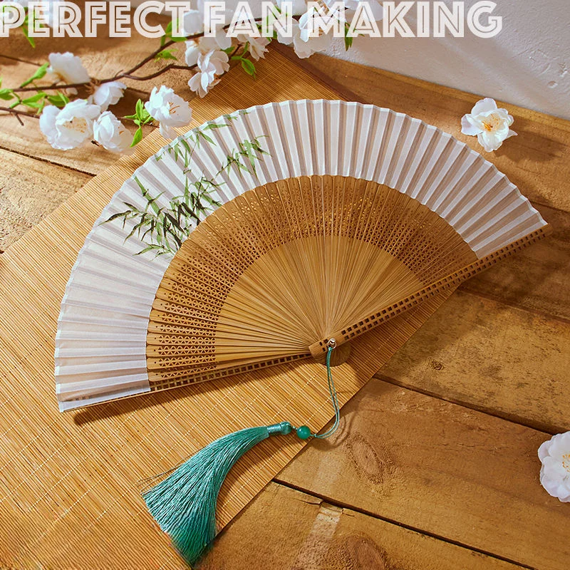 

New Chinese folding hollow folding fan portable Chinese style red black classical dance fan decorative fan