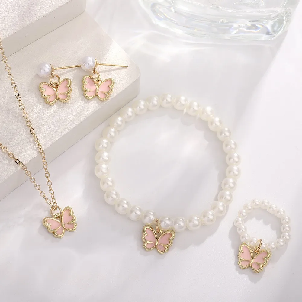 Gold-tone bracelet with butterfly charm