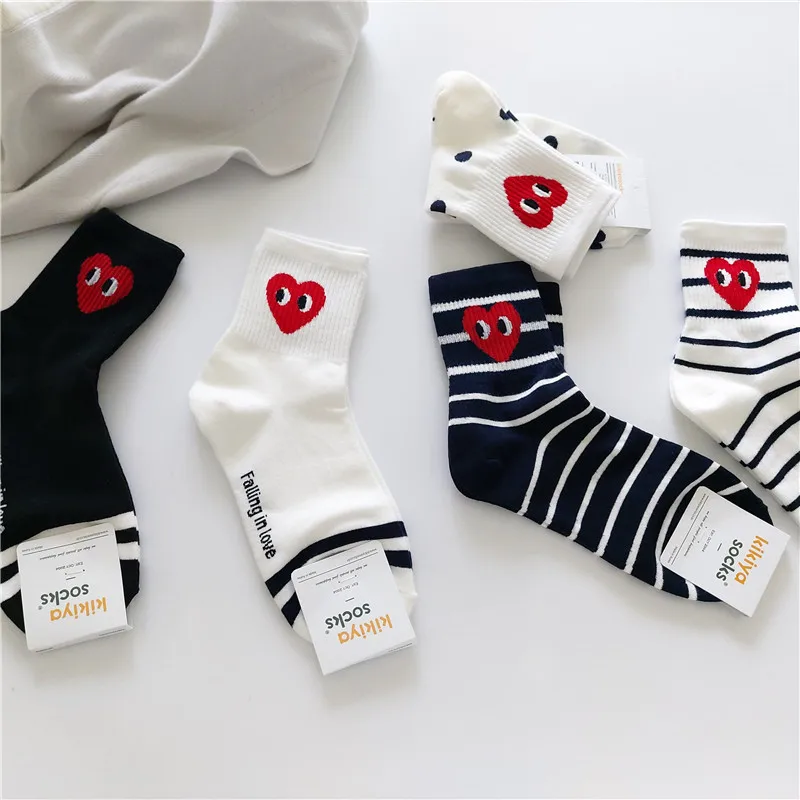 

New socks female Korean version black and white stripes polka dot solid color love fashion in the cylinder leisure sports wind i