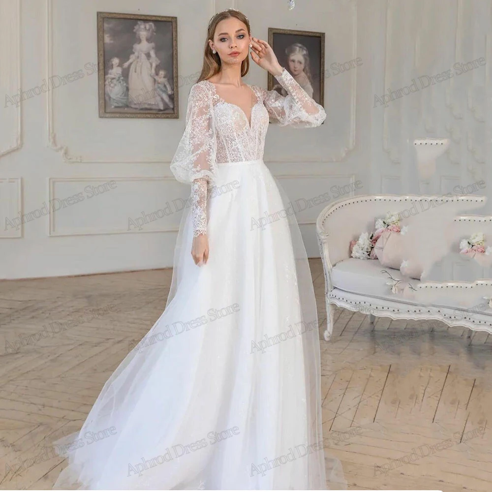 Suknie ślubne w stylu Vintage suknie ślubne typu A-line z koronkowymi aplikacjami do podłogi efektowne szaty dla panny młodej Vestidos De Novia
