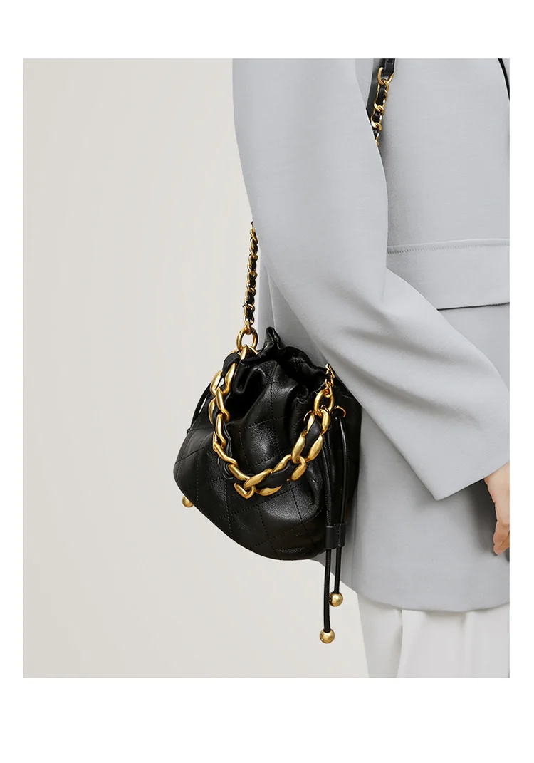 S10ea0aac32d841dca607b9780d211643e Genuine Leather Quilted Drawstring Bucket Bag for Women with Chain Strap Crossbody Handbag for Daily Use and Commuting Mallzona