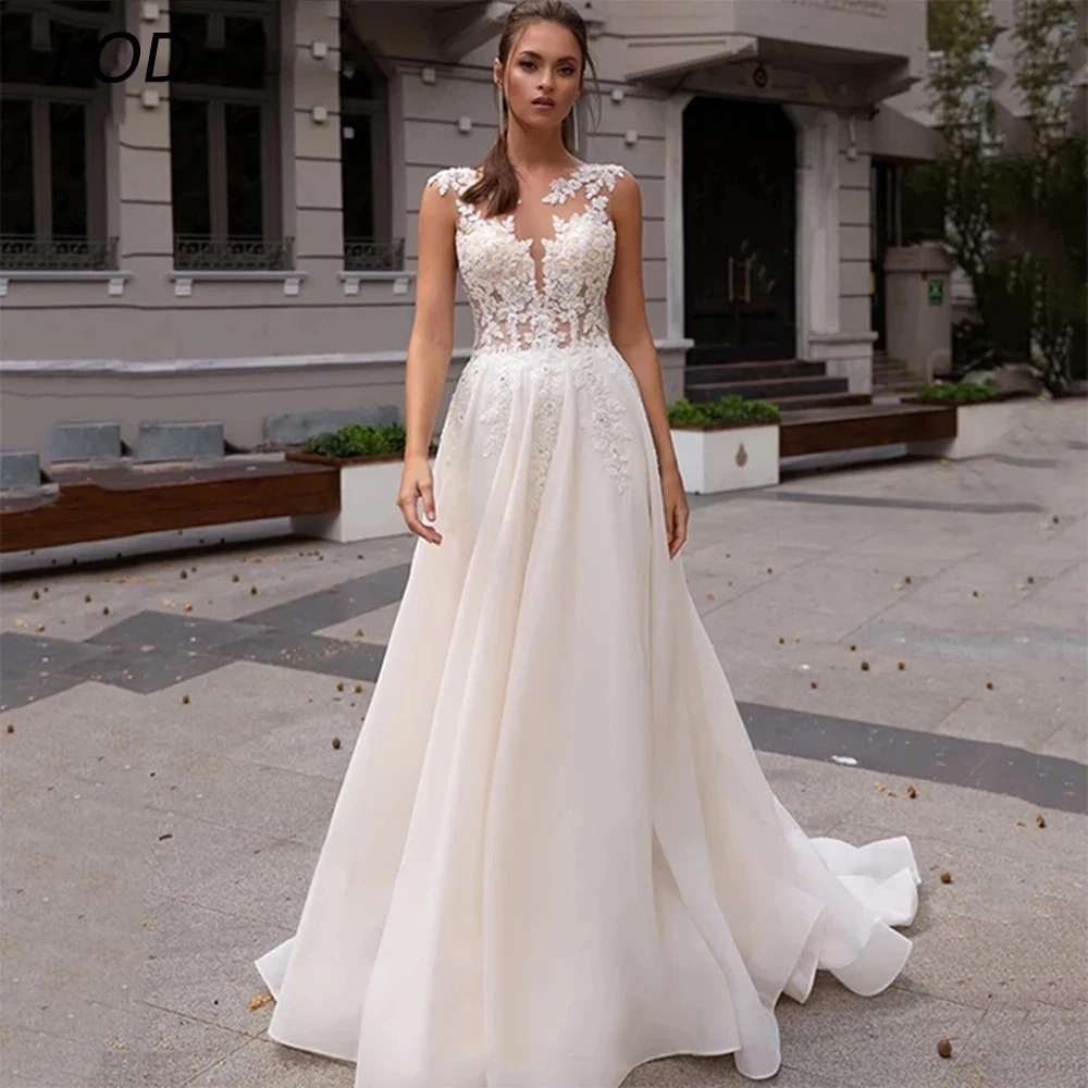 

I OD Elegant A-Line Wedding Dress O-Neck Lace Applique Sleeveless Illusion Button Bridal Gown Floor Length Vestidos De Novia New