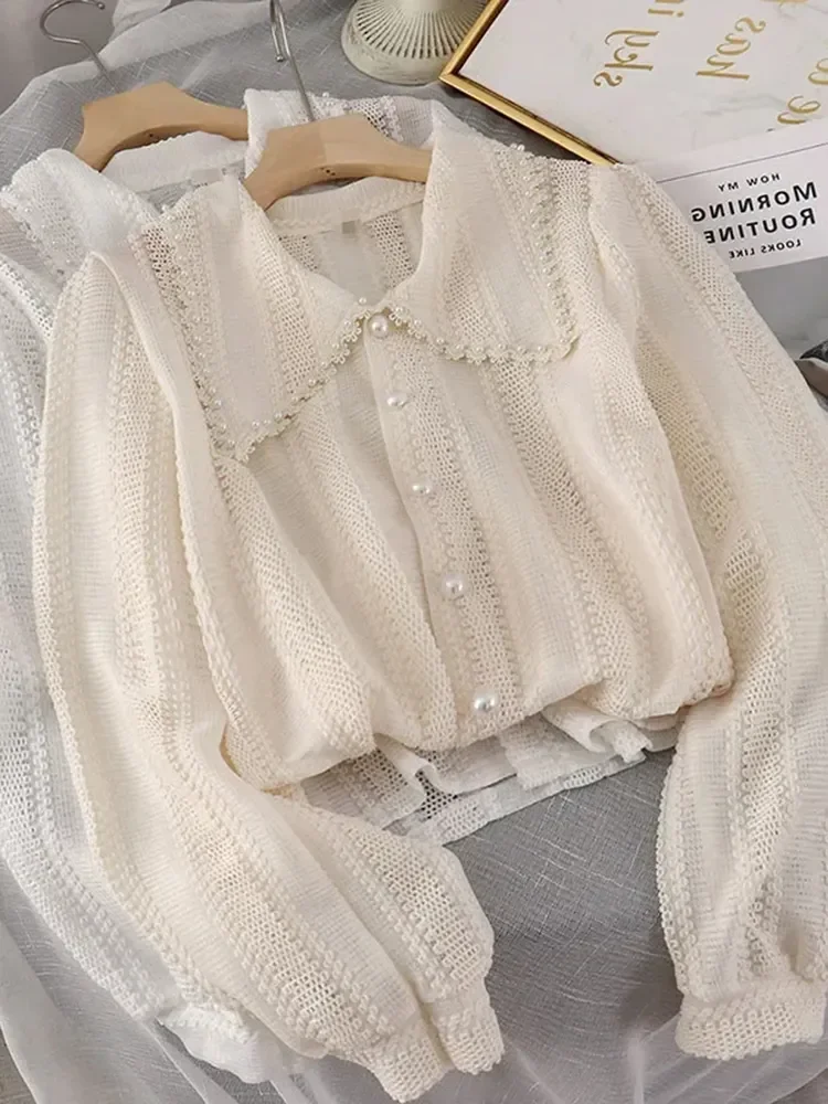 

Fashion Hollow Out Peter Pan Collar Blouses Women Spring Elegant Single-breasted Pearl Button Decoration Tops Korean Thin Shirt