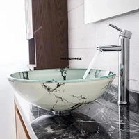 อ่างล้างหน้าแบบกระจกลายหินอ่อนสีขาว อ่างล้างหน้าในห้องน้ำโรงแรม อ่างล้างหน้าในห้องน้ำพร้อมเฟอร์นิเจอร์ อ่างล้างหน้าทรงกลมแบบวางบนเคาน์เตอร์ 5