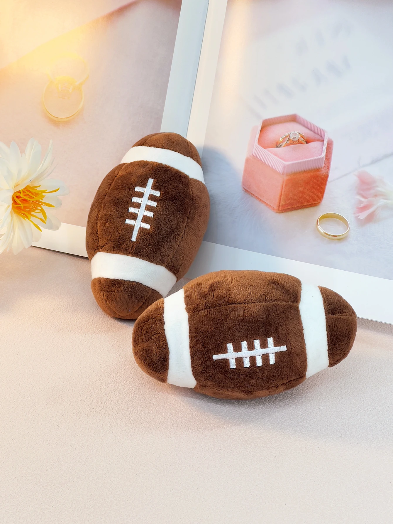 A pet plush toy can be a sound ball-shaped pet training toy interactive play small football pet toys for pet use only A pet plush toy can be a sound ball-shaped pet training toy interactive play small football pet toys for pet use only