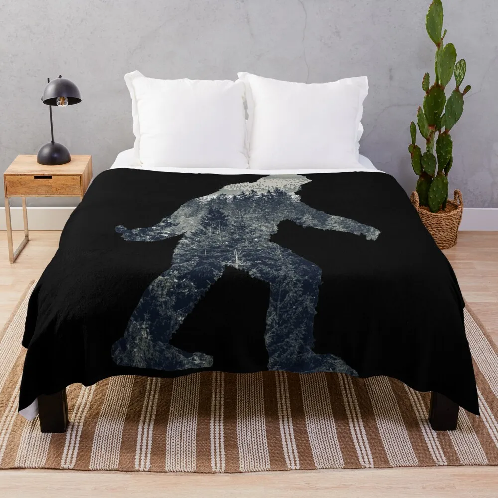 

A Sasquatch Silhouette in The North Throw Blanket Hairy Flannel Fabric Dorm Room Essentials Blankets