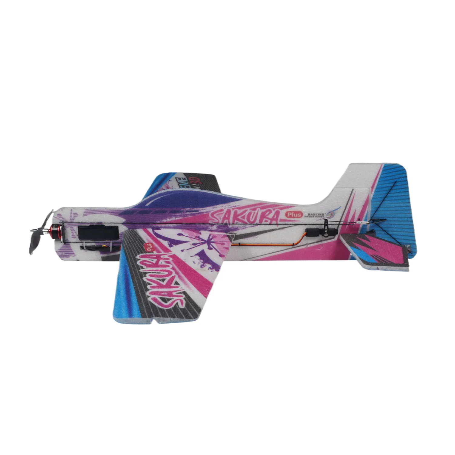 Avion RC EPP 600mm posé sur l'herbe, prêt pour un vol performant.