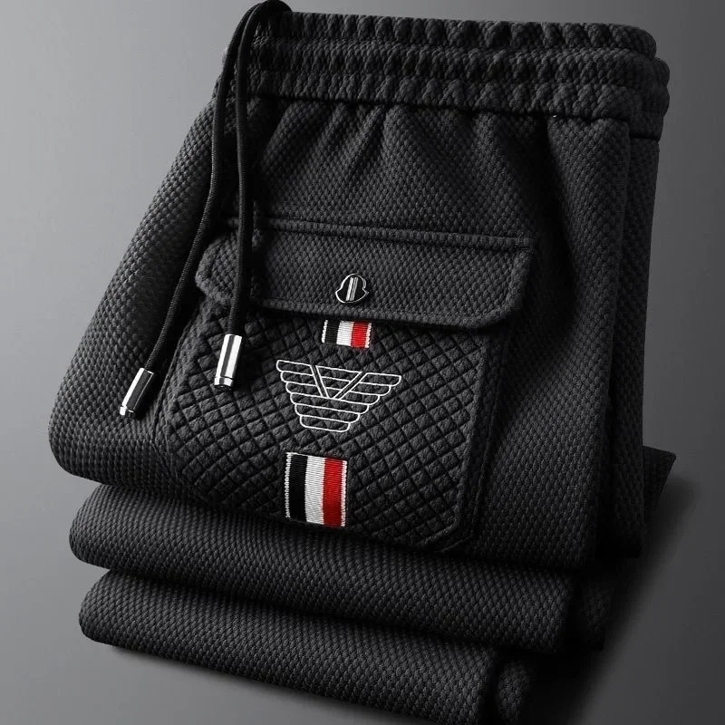 Luxury brand jacquard casual pants men's spring autumn high-end waffle elastic waistband drawstring pocket embossed sports pants 3