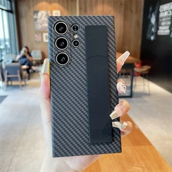 Carbon Fiber Texture Silicone Elastic Wrist Strap Shockproof Phone Case - Samsung S25Ultra (Black)