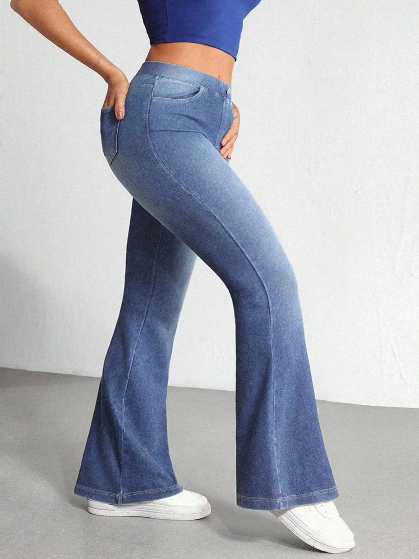 Jean bootcut taille haute extensible dans les quatre sens, grande taille, en denim doux avec effet ventre plat