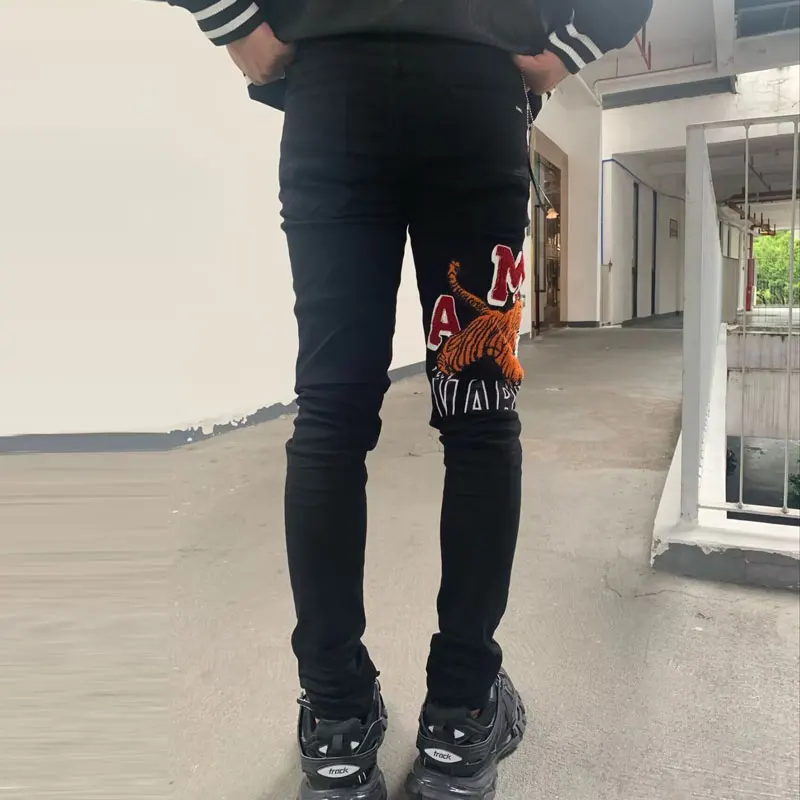 Latest Designer High Street Fashion New Elastic Jeans Slim Fit Retro Wash Black Hole Patch Tiger Pattern Jeans Hip Hop Brand Ver
