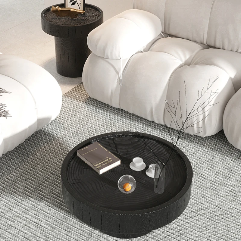 

Solid wood carbonized black round designer tea table living room side several homestay retro wooden chopping blocks