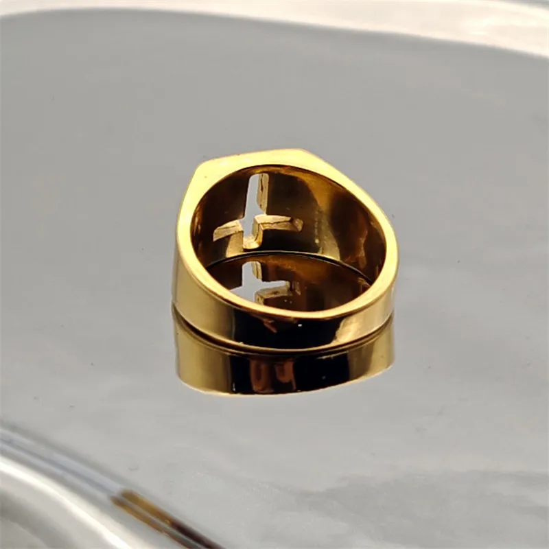 316L stainless steel hollow out cross ring in gold finish for men and women, modern unisex jewelry design.