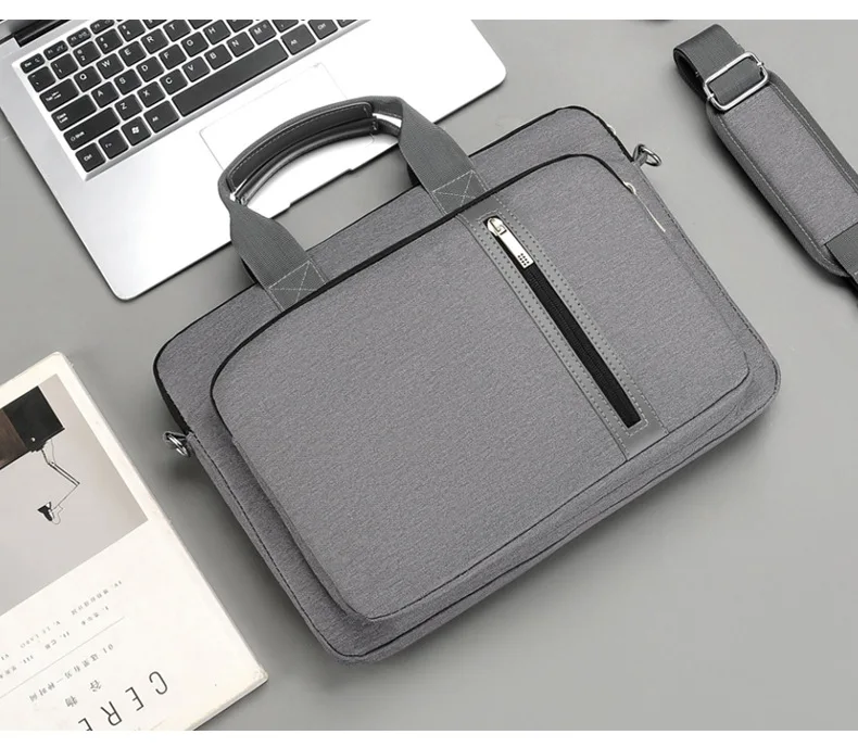 Laptop messenger bag showing waterproof and shock-resistant features.