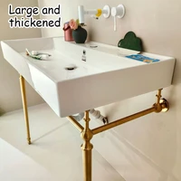 อ่างล้างหน้าแบบตั้งพื้นทรงเรียบง่าย พร้อมขาตั้งทองเหลือง อ่างเซรามิก ดีไซน์มินิมอล ขนาดใหญ่ หนาพิเศษ อุปกรณ์ห้องน้ำสำหรับใช้ในบ้าน 2