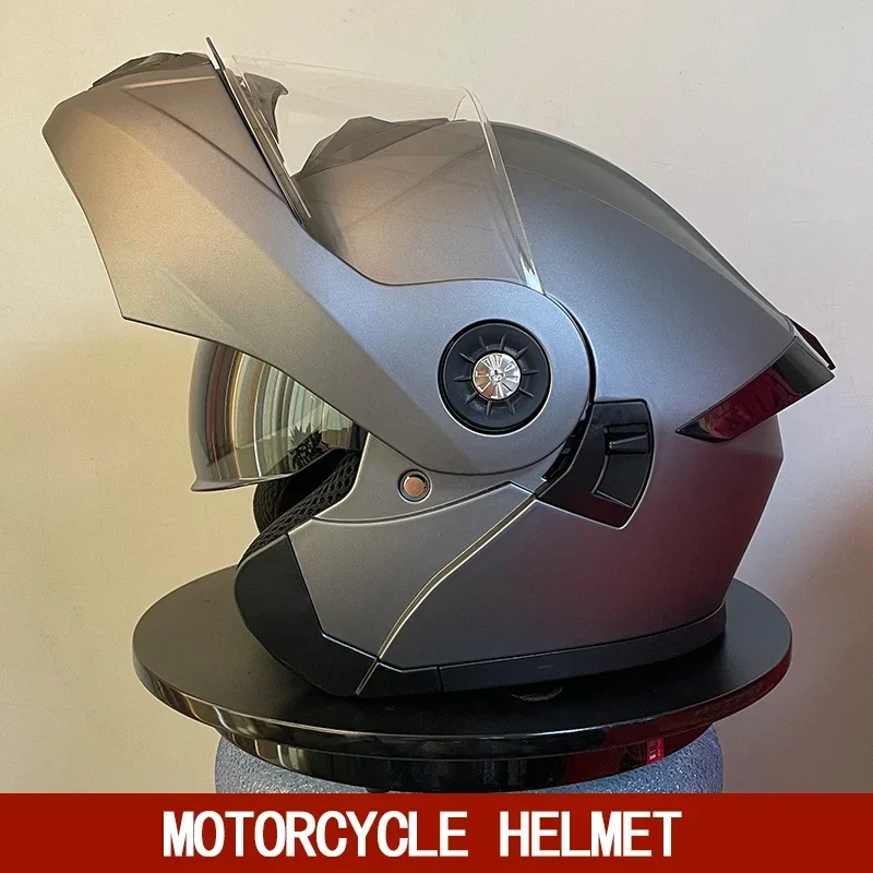 

Double-lens motorcycle with internal sun visor affordable for everyone, with full-face helmet turned up.