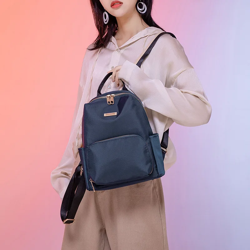 New women's bags women's bags trend Korean version of pure color simple and fashionable Oxford cloth ladies backpack