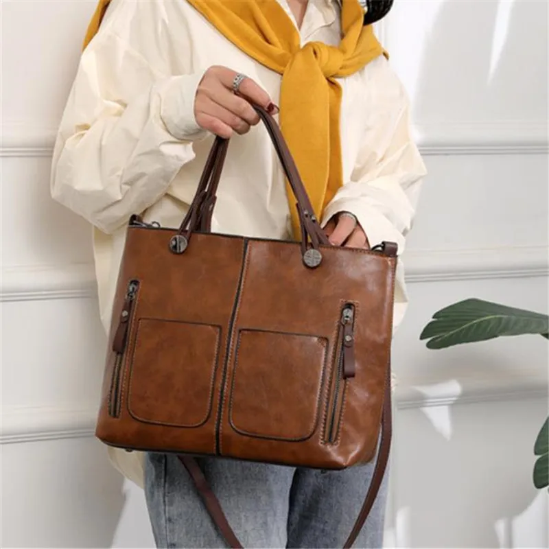 Retro leather handbag with two zipper pockets, versatile tote and crossbody style, classic women’s work and business bag. 4578632