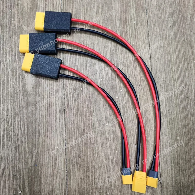 Câble charge XT60 vers SDC 400W pour DJI Power 1000, enroulé sur fond gris, étiquette de spécifications visible.