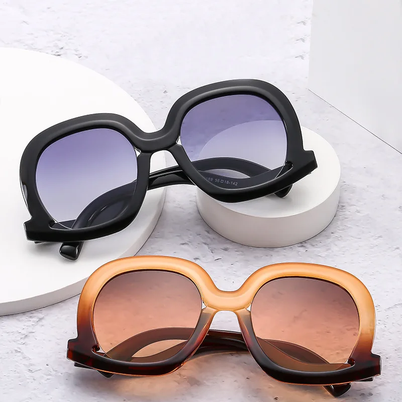 

Новые модные трендовые женские солнцезащитные очки в европейском и американском стиле с большой оправой и неровной оправой для уличного фото