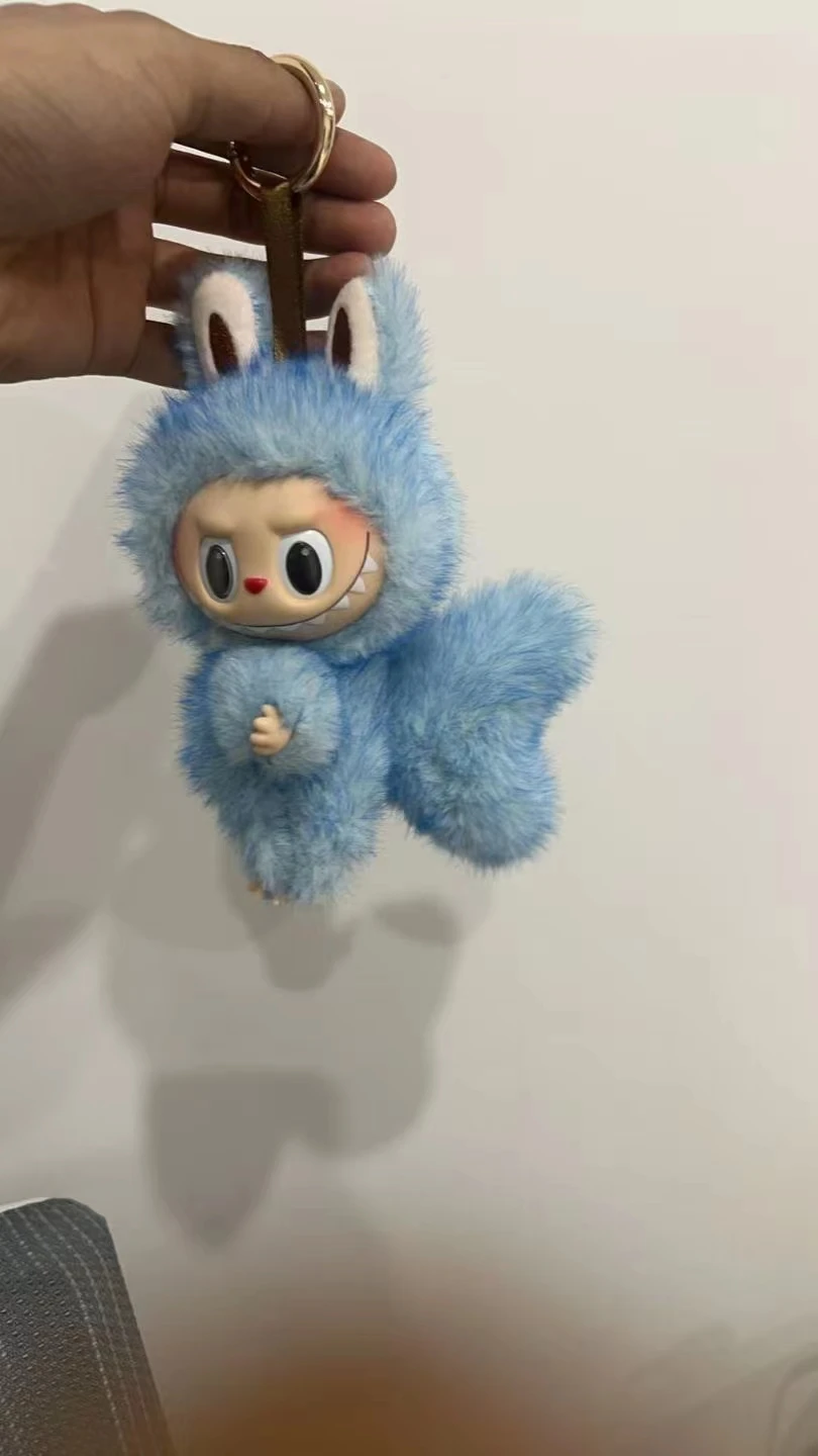 Labubu-style 17CM plush doll with vinyl face and soft costume – collectible gift toy with free shipping to Singapore.