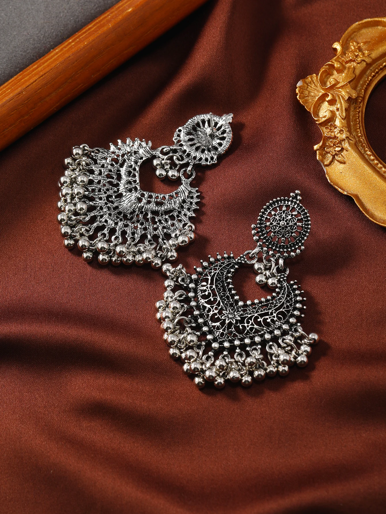 Exaggerated Bohemian Hollow Love Bell Earrings