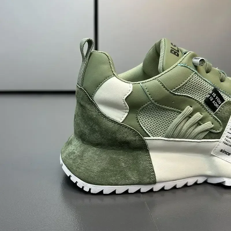 The back of a white and green summer sneakers