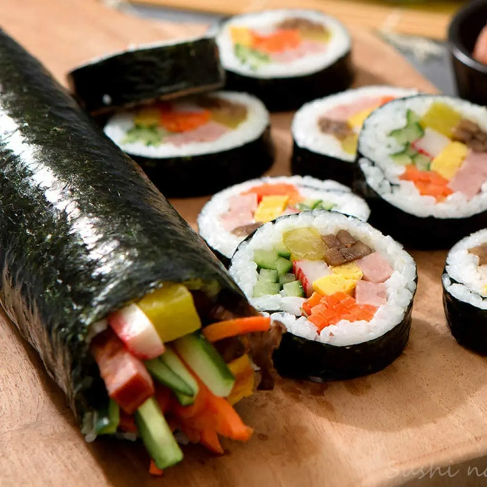 https://ae01.alicdn.com/kf/S12493458918d41b6aac565136a3eec9a6/Sushi-Tool-DIY-Sushi-Maker-Roller-Rice-Mold-Sushi-Making-Machine-Vegetable-Meat-Rolling-Device-Onigiri.jpg