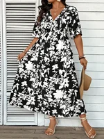 Elegant plus-size black and white floral A-line dress, floor-length, machine washable, round neck design, suitable for spring an