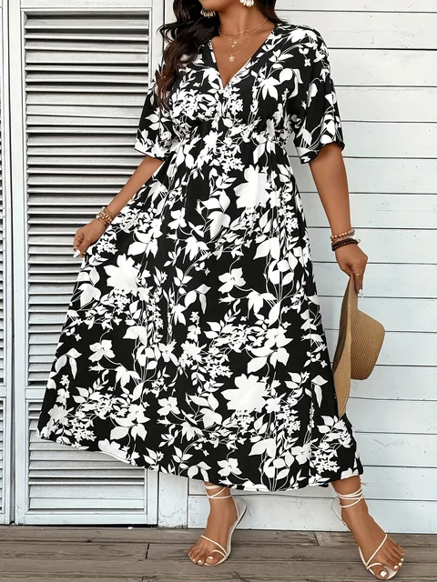 Elegant plus-size black and white floral A-line dress, floor-length, machine washable, round neck design, suitable for spring an