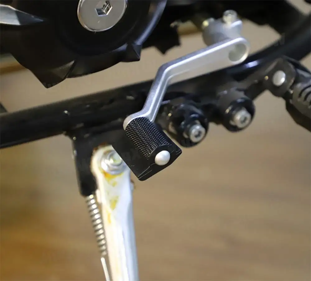 S127c8b7f2a1a4a64a96b2a92ae42406bD Motorcycle Shift Gear Lever Pedal Universal Rubber Cover Shoe Protector Foot Peg Toe Gel Decoration Accessory Mallzona