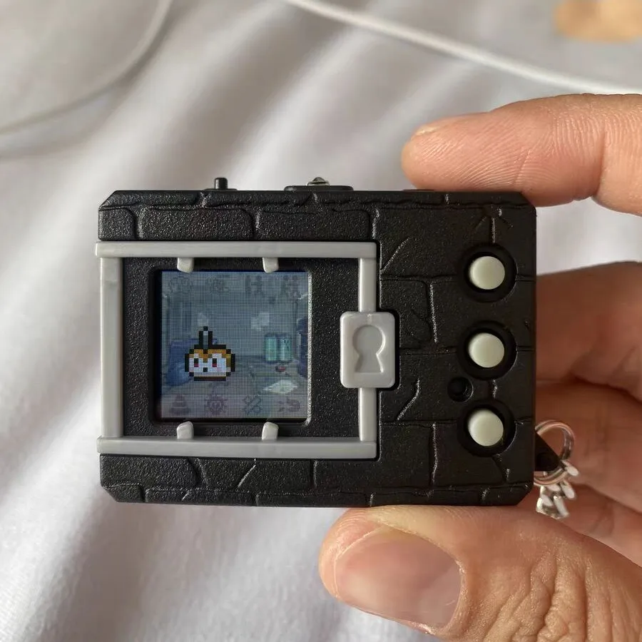 

Лимит тамагочи Bandai, Цифровой Монстр Yuanzu, машина тираннозавра, перепечать на 25-й годовщине, цветная пластина, игровая консоль