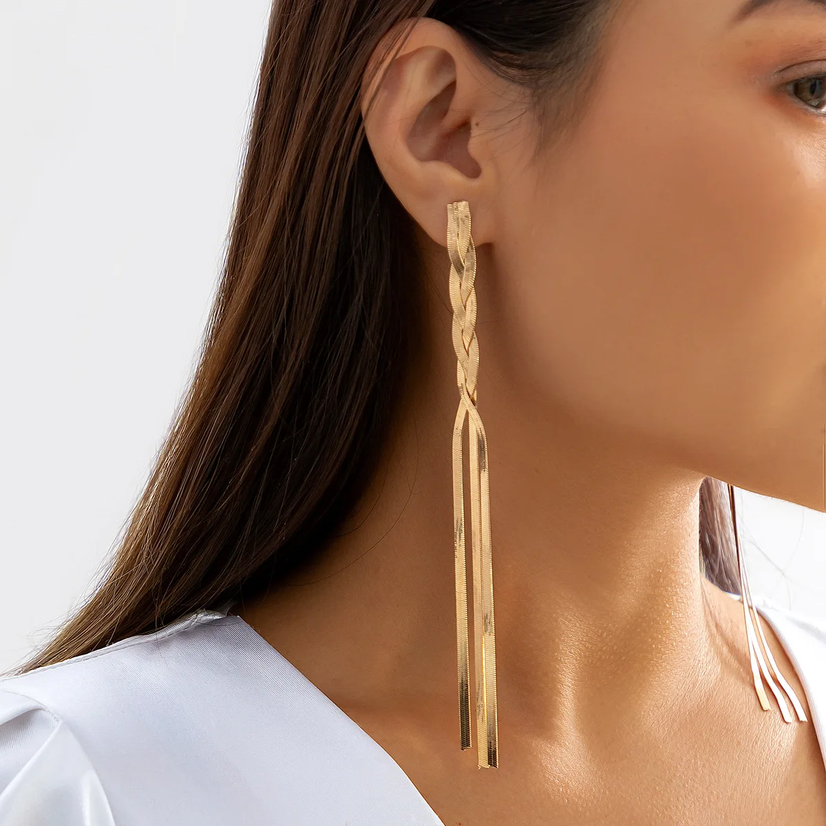 

Metal snake bone woven chain earrings