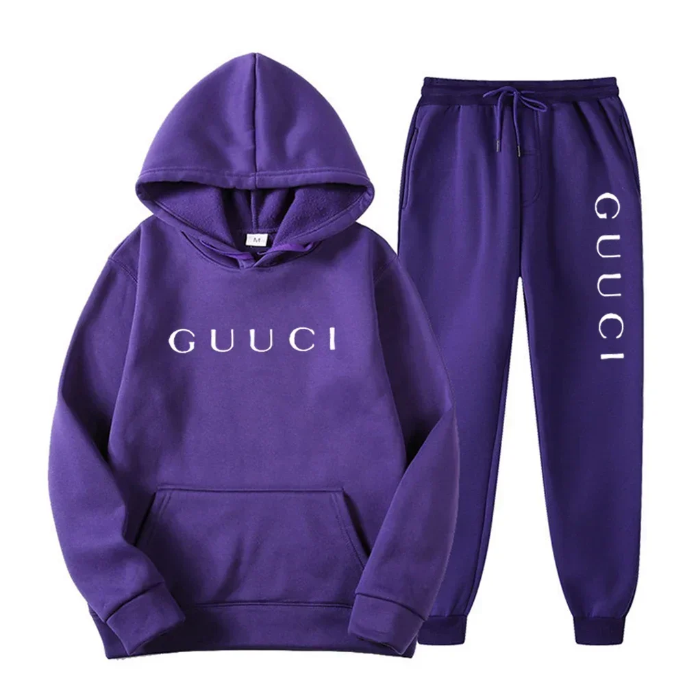 Man wearing autumn streetwear jogging set in urban outdoor setting dark purple