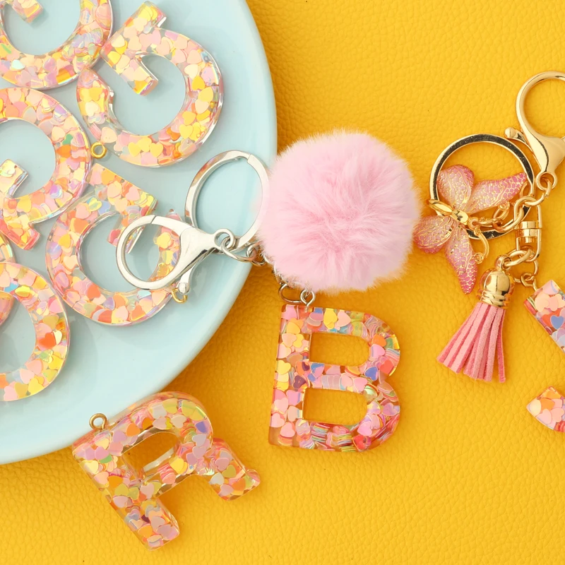 Homemade Custom Resin Letter Initial Keychain With Pom Pom and 