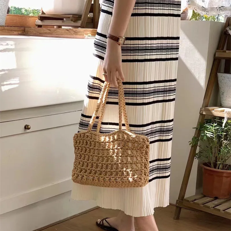 

2023 New Copper Coin Buckle Handmade Cotton Hollow Out Handbag With Lining Woven Bag Hand Grid Cutout Straw Bag Casual Woven Bag