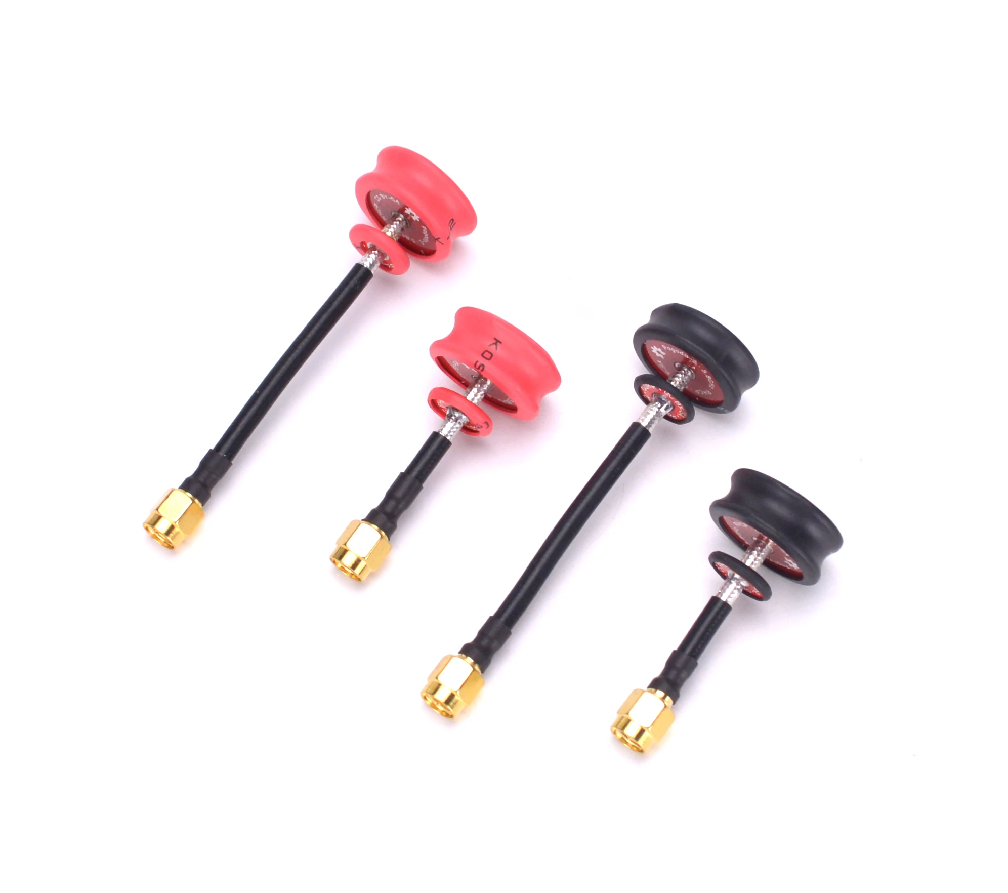 Gros plan sur une antenne FPV VTX VRX RPSMA SMA courte, montrant le filetage et le connecteur.