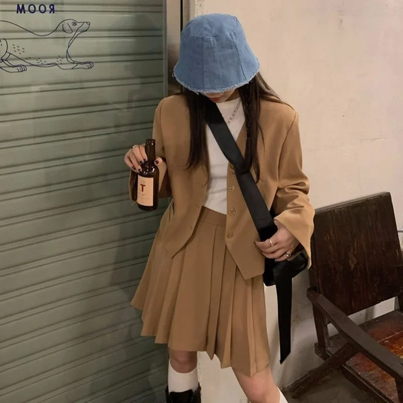 Fashion 2021 Casual Suit Skirt Suit Temperament Short Long Sleeve Suit High Waist Sexy Pleated Skirt Fashion Two-piece Female 2021 autumn new ol suit female fashion sexy hot girl small suit slightly slit strap short skirt pure color temperament suit