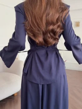 طقم بلوزة بياقة عالية وبنطال واسع أنيق — صورة 5